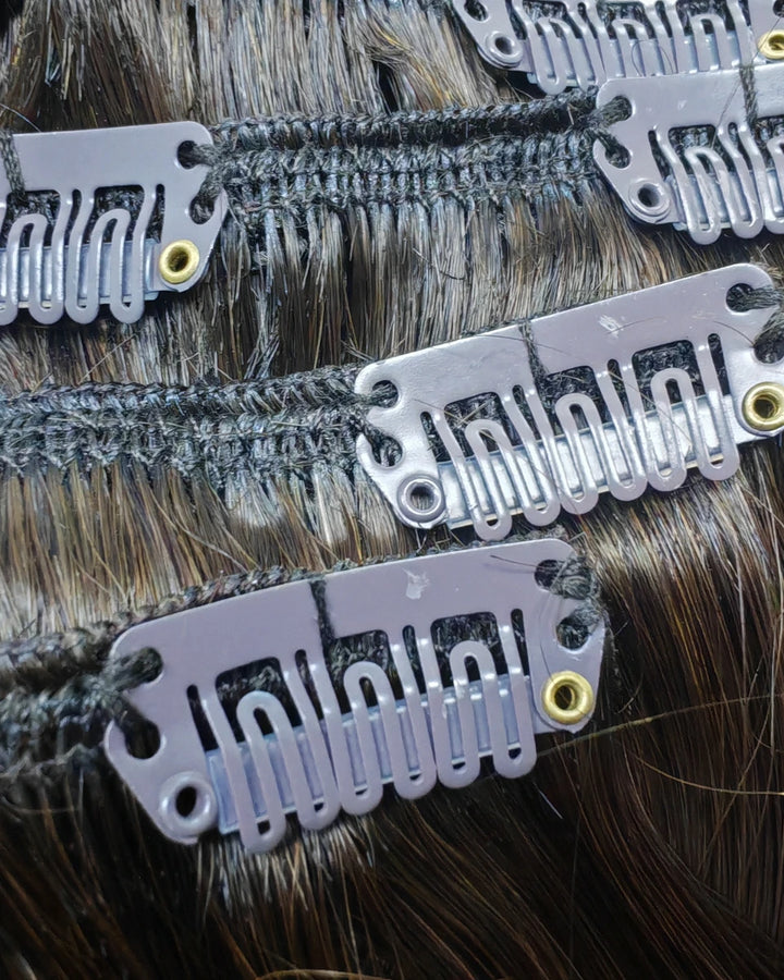 Durable clip-in extensions designed for thick hair, offering no-slip, secure hold and long-lasting volume.