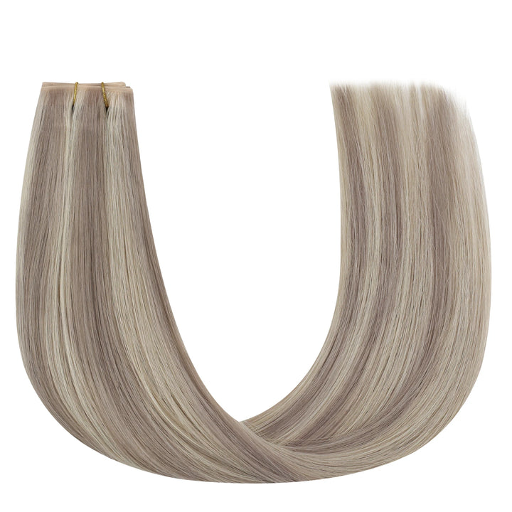 Long, highlighted butterfly weft extensions designed for thicker, more voluminous hair.