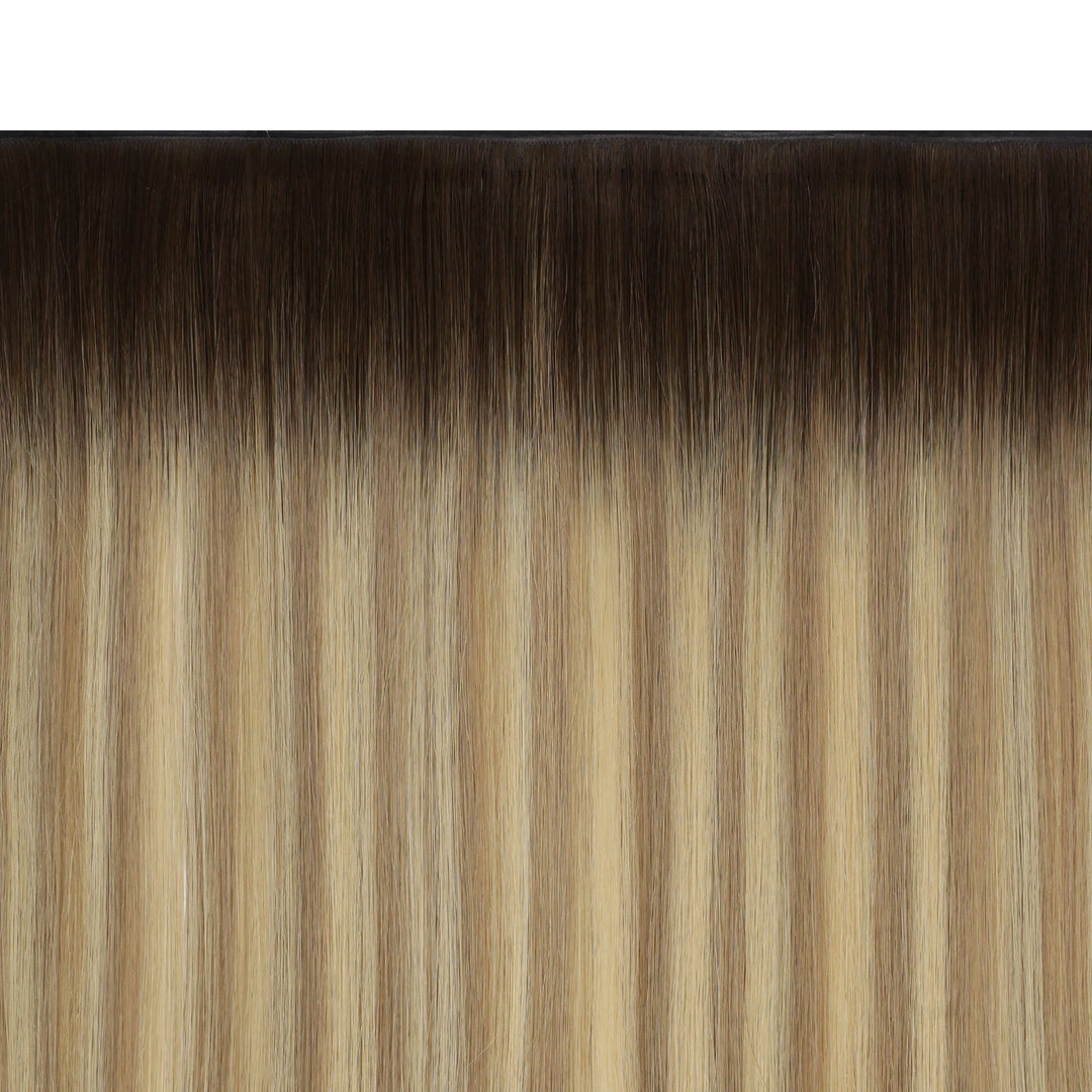 Full-volume balayage butterfly wefts enhanced with rich golden tones for a luxurious look.