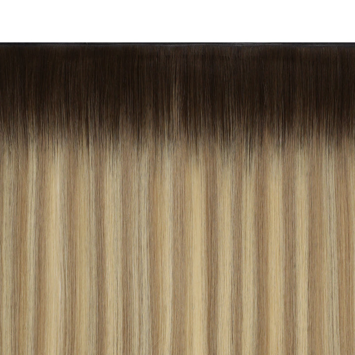 Full-volume balayage butterfly wefts enhanced with rich golden tones for a luxurious look.