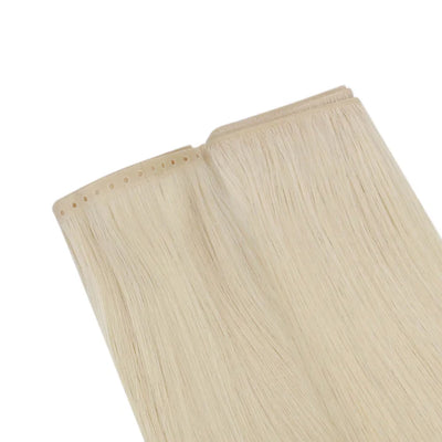 Ultra-flat butterfly weft hair extensions blending naturally into fine hair.