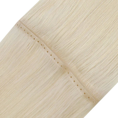 PU hole butterfly weft extensions in  blonde, seamless and lightweight.
