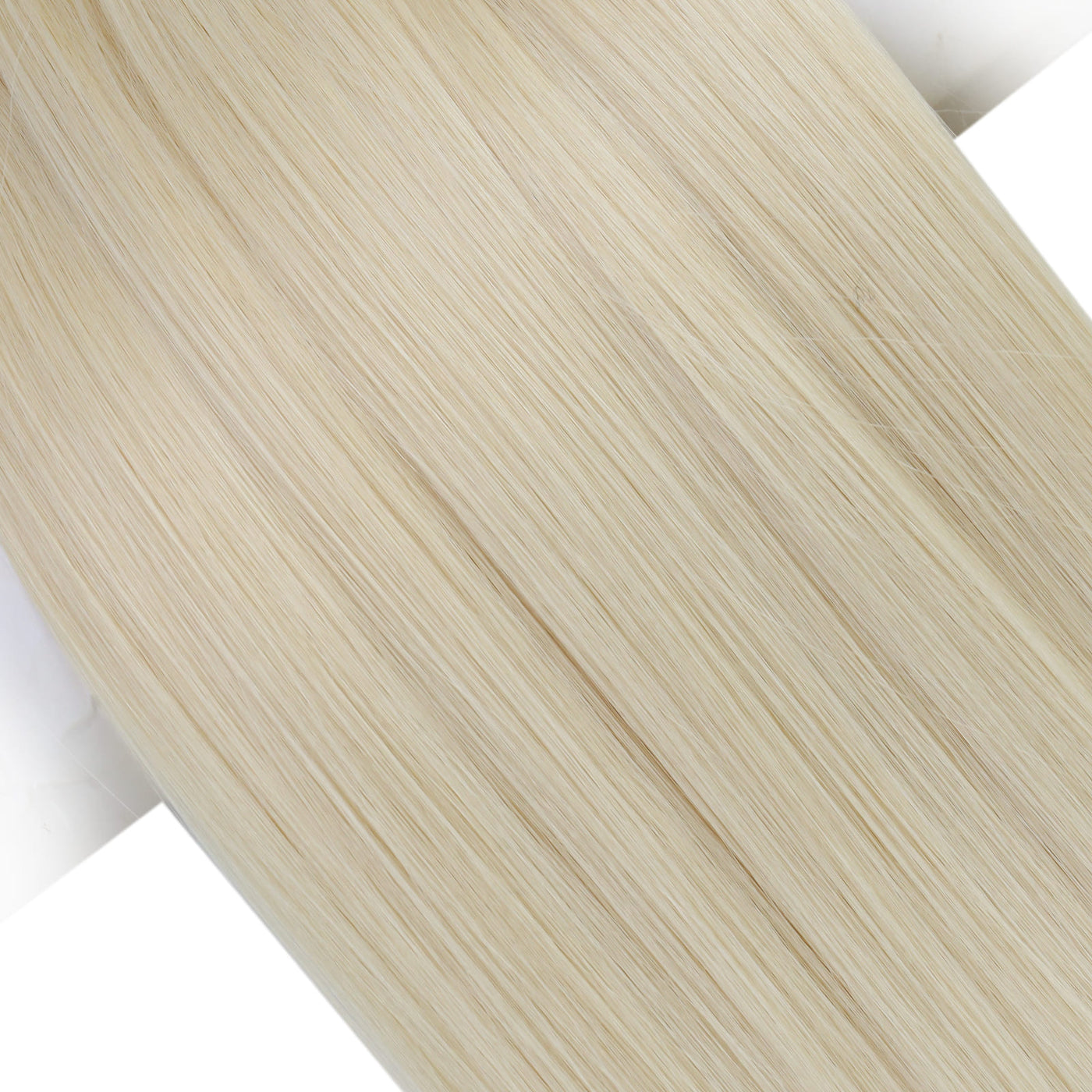 Blonde genius weft extensions in platinum shade