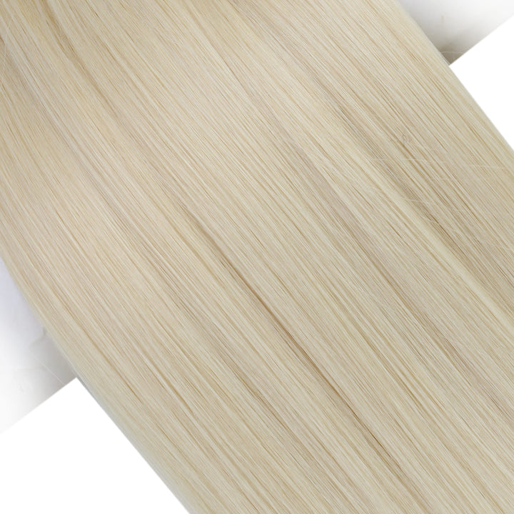Blonde genius weft extensions in platinum shade
